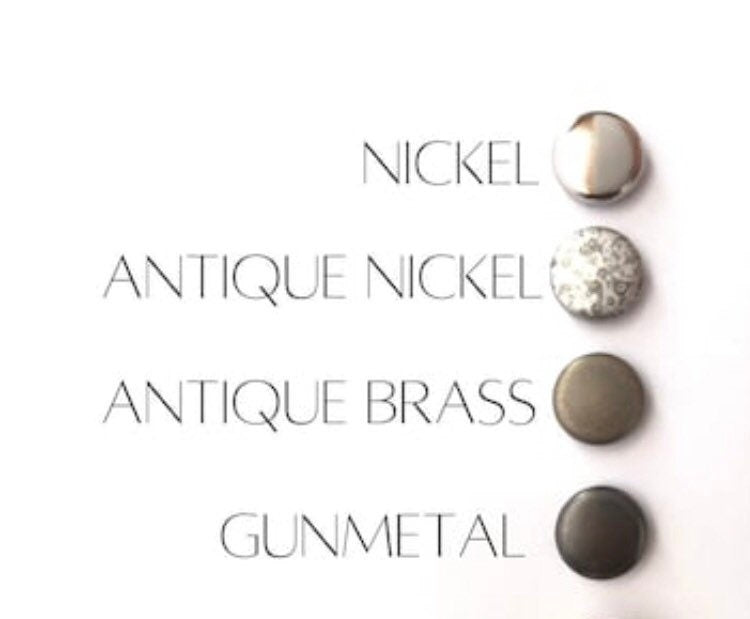 Metallic buttons labeled 'Nickel', 'Antique Nickel', 'Antique Brass', and 'Gunmetal' on a white background.